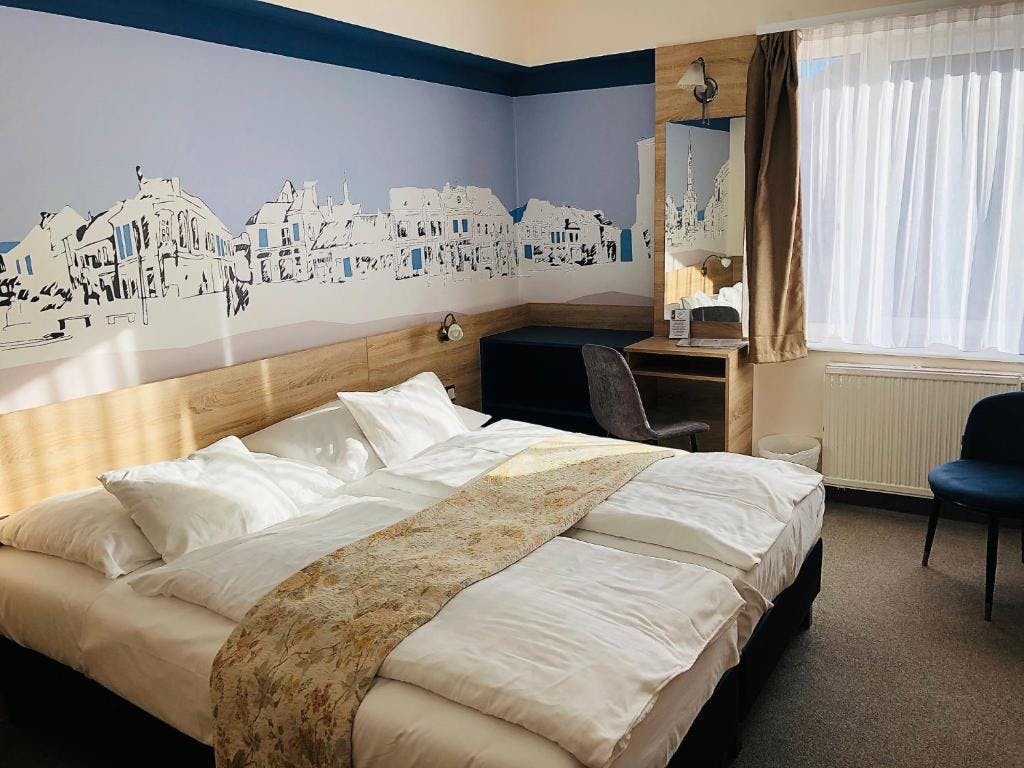 Hotel Irottko - Družinski oddih, Kőszeg, Madžarska - 162 EUR - 2x nočitev v dvoposteljni sobi za 2 osebi (1 otrok od 0 do 11,99 let brezplačno), Polpenzion (samopostrežni zajtrk in samopostrežna ali 4-hodna večerja)